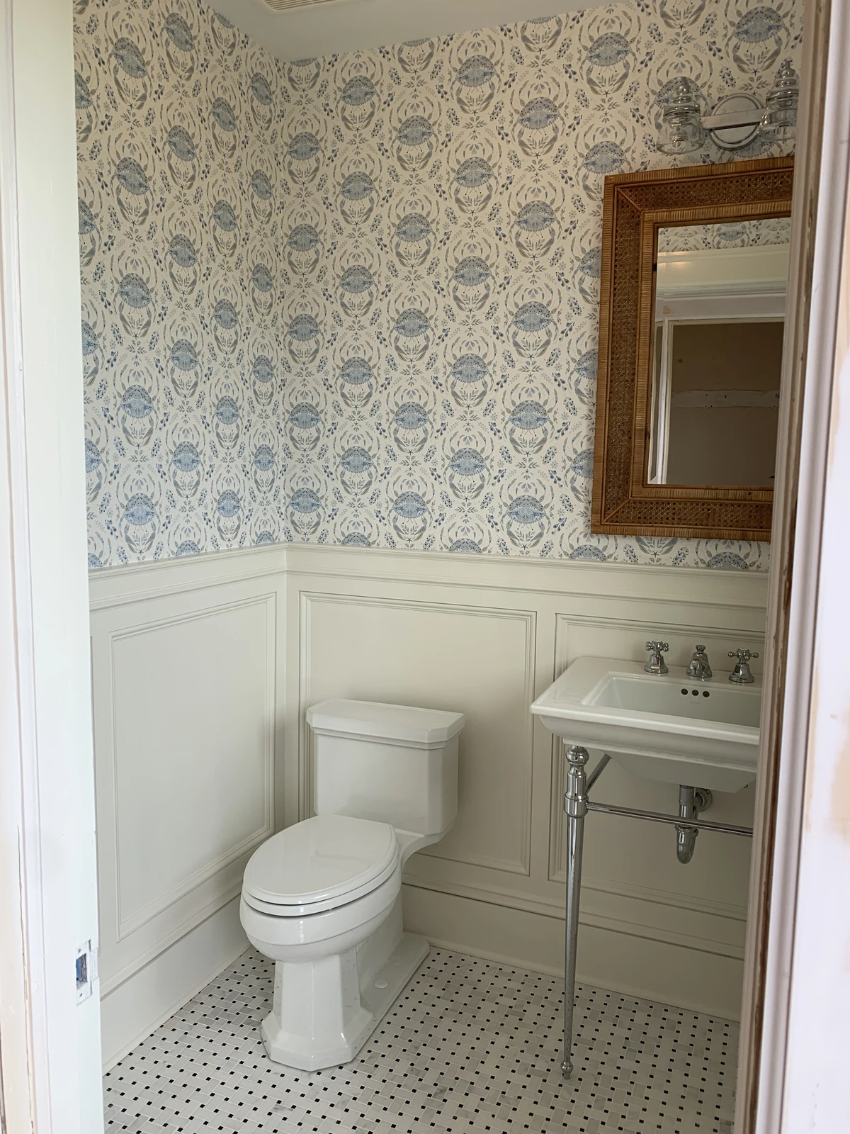 Powder room with wainscot and hex tile