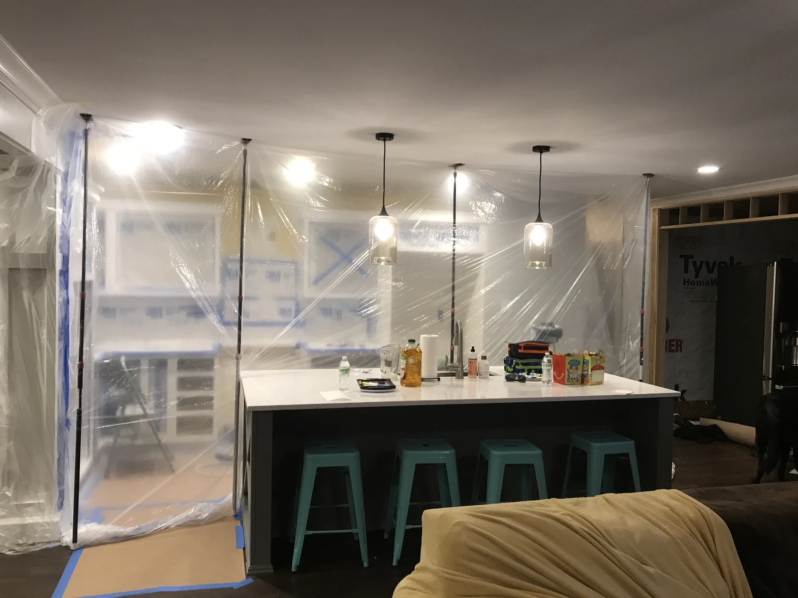 Plastic dust wall during a lived-in remodel