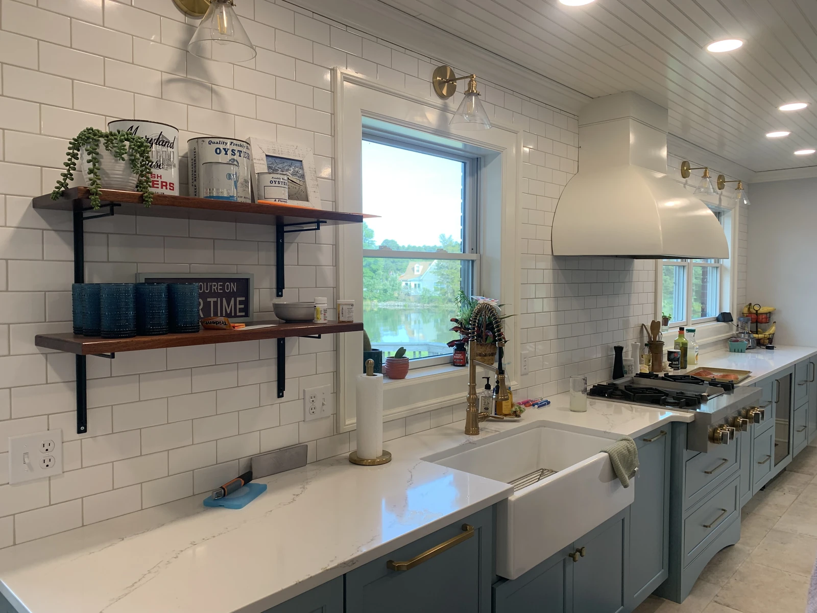 Kitchen with farmhouse sink and tile backsplash