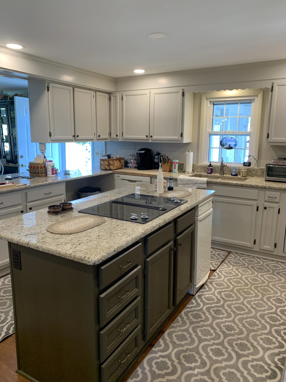 Same kitchen after white spray cabinets and painted island
