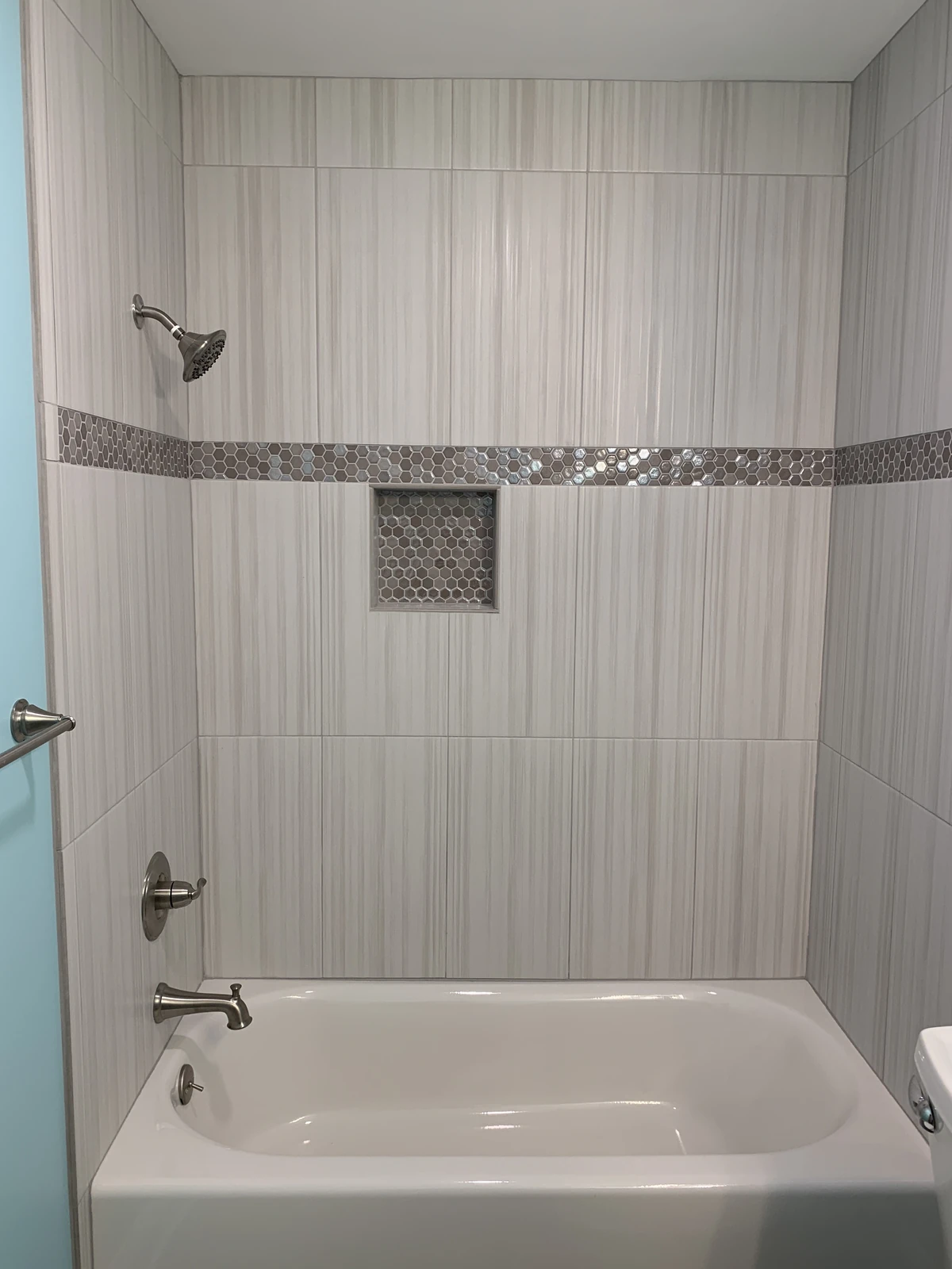 Wood-look tile tub and shower